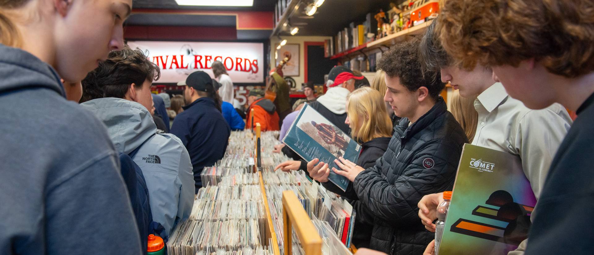 customers checking out vinyl albums at Revival Records store