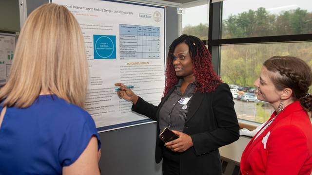 Grad student presents research poster