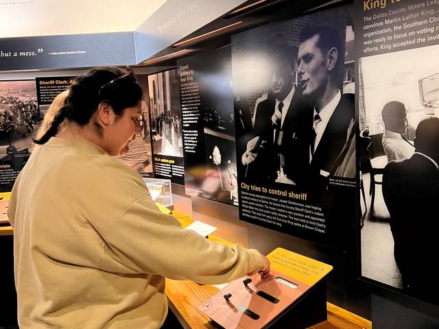 students in a cultural center museum about Emmet Till