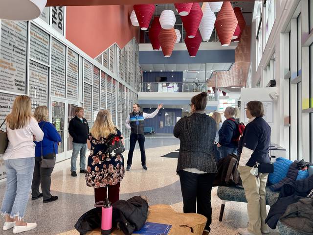 Parent & Family Ambassadors receive a private tour of the Pablo Center during their Spring Retreat, with Executive Director of the Pablo Center Jason Jon Anderson enthusiastically providing key details about the space.