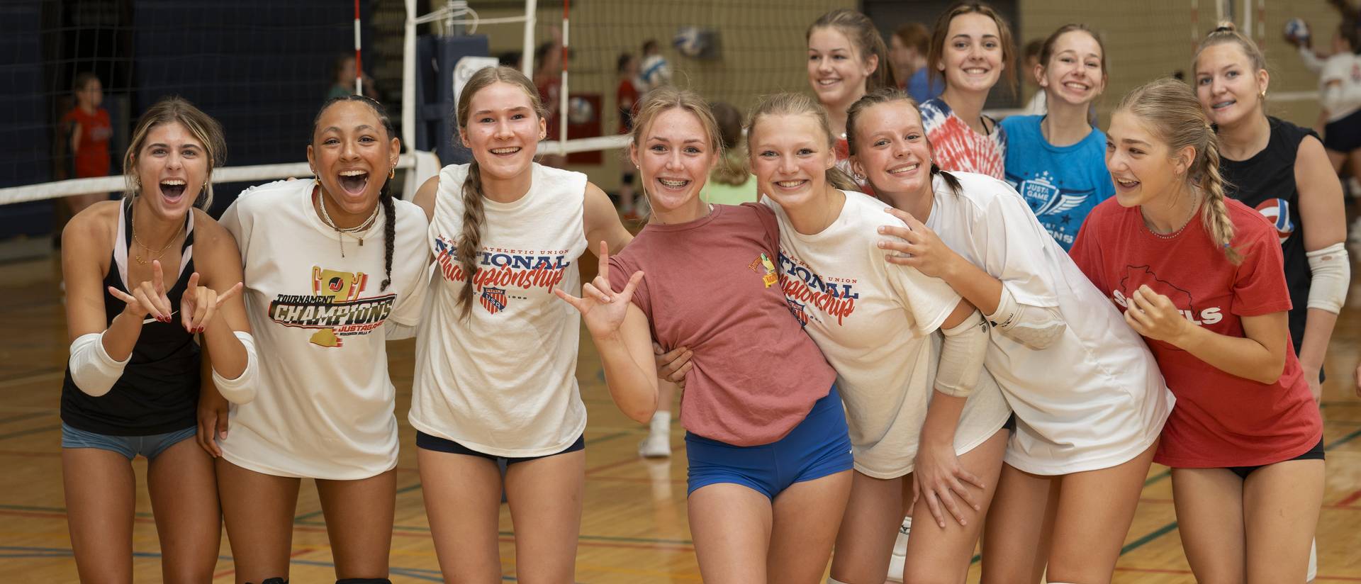 volleyball youth players posing for group shot