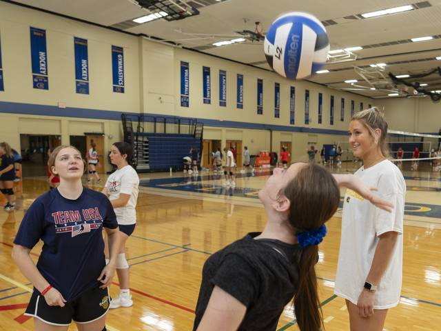 Blugold VB player Abigail Wherlund coaching youth at summer VB camp