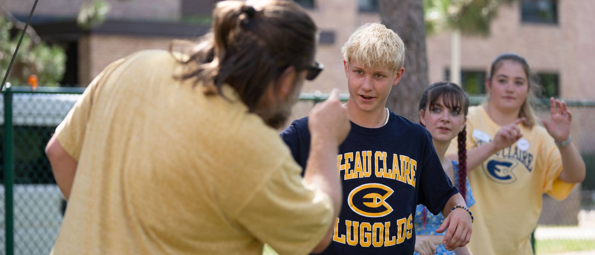 Services for Students with Disabilities  students and staff partake in ropes course activities