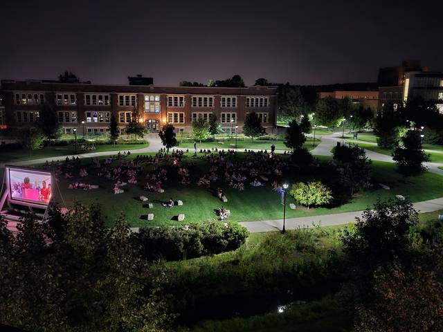 late night event from AUC, movie night on campus mall, viewers spread across campus mall, image from rooftop