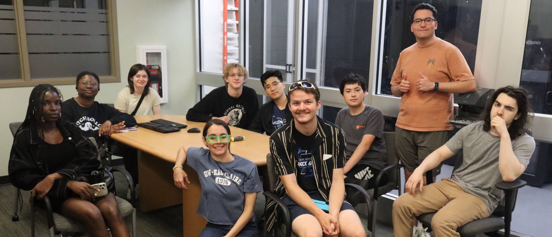 Group picture of students participating in the Research Experiences for Undergraduates (REU) program on a tour at our data center.