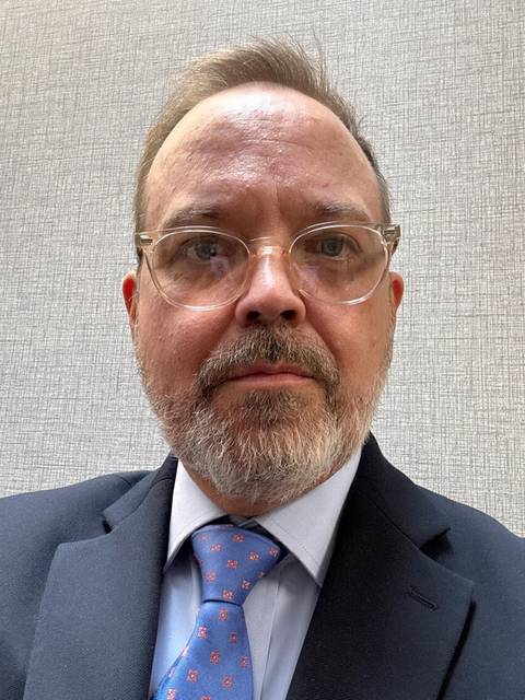 Headshot photo of Glenn R. Kauppila