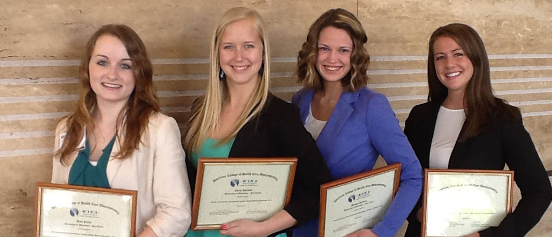UW-Eau Claire HCAD students (from l to r) Ariel Fuller, Emily Kjelstad, Bridget Staberg, and Lori Mahan are recognized for their research posters at the 48th Annual ACHCA Convocation and Exposition and Student Poster Session in Las Vegas, NV, April 5–9, 2