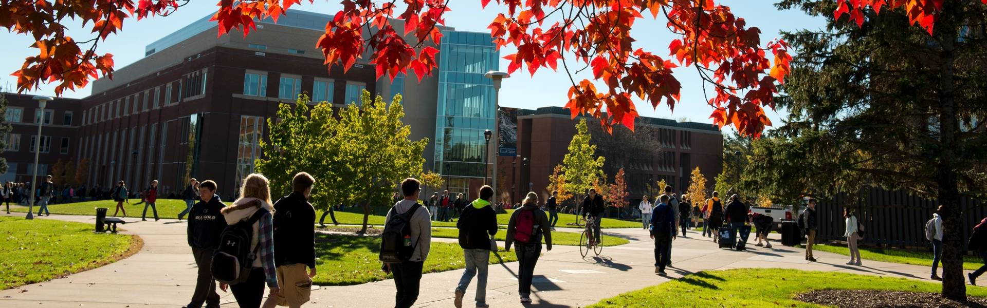 Students walking on campus in fall