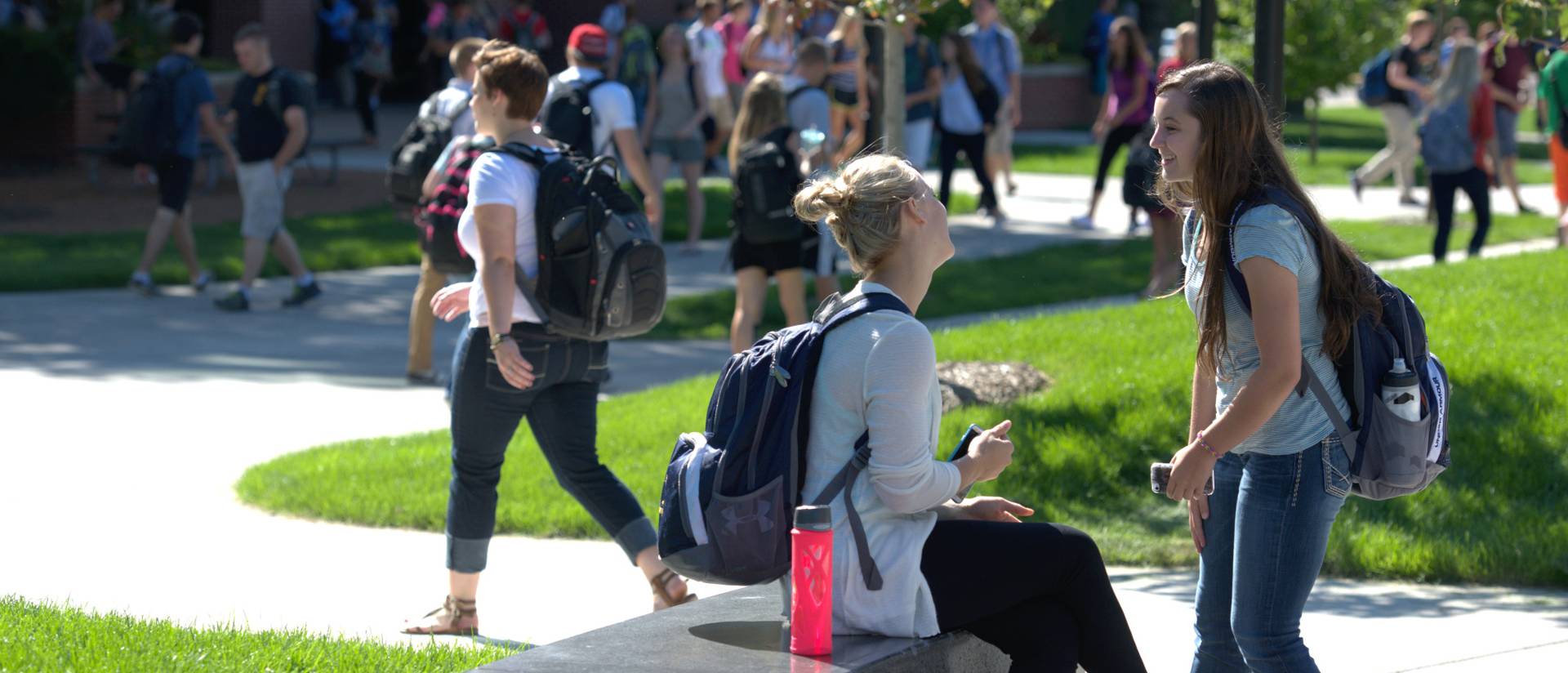 Students catch up on the first day of classes.