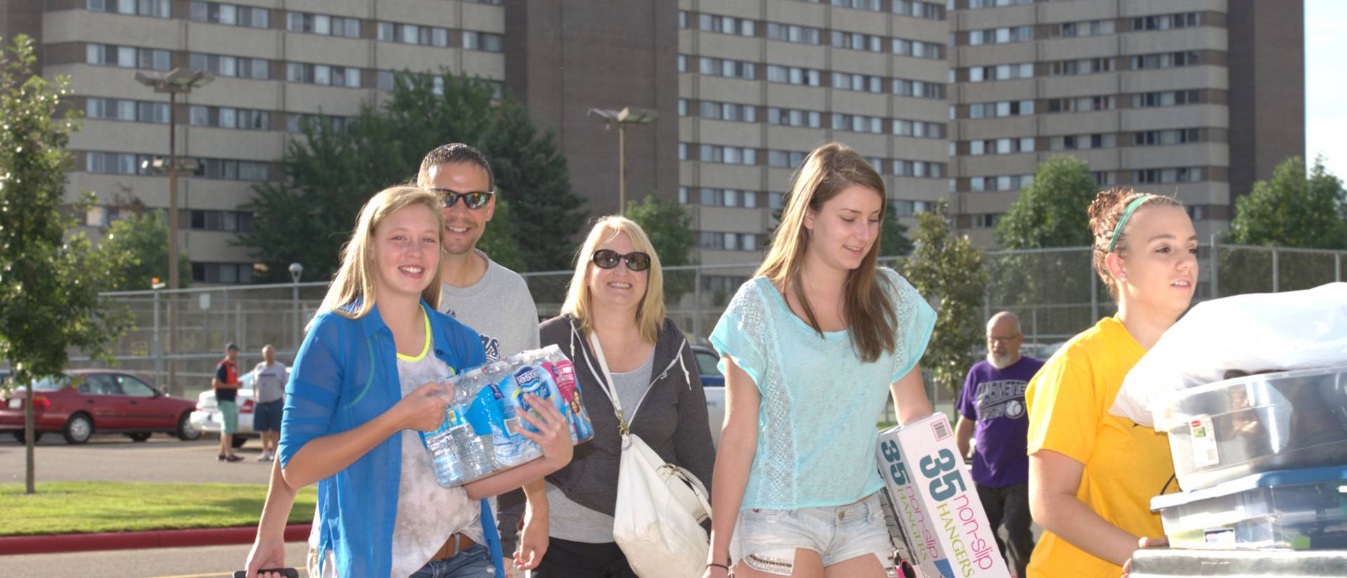 A family poses after a successful move-in to the dorms.
