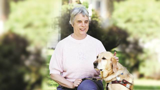 Dr. Katherine Schneider and her Seeing Eye dog, Luna