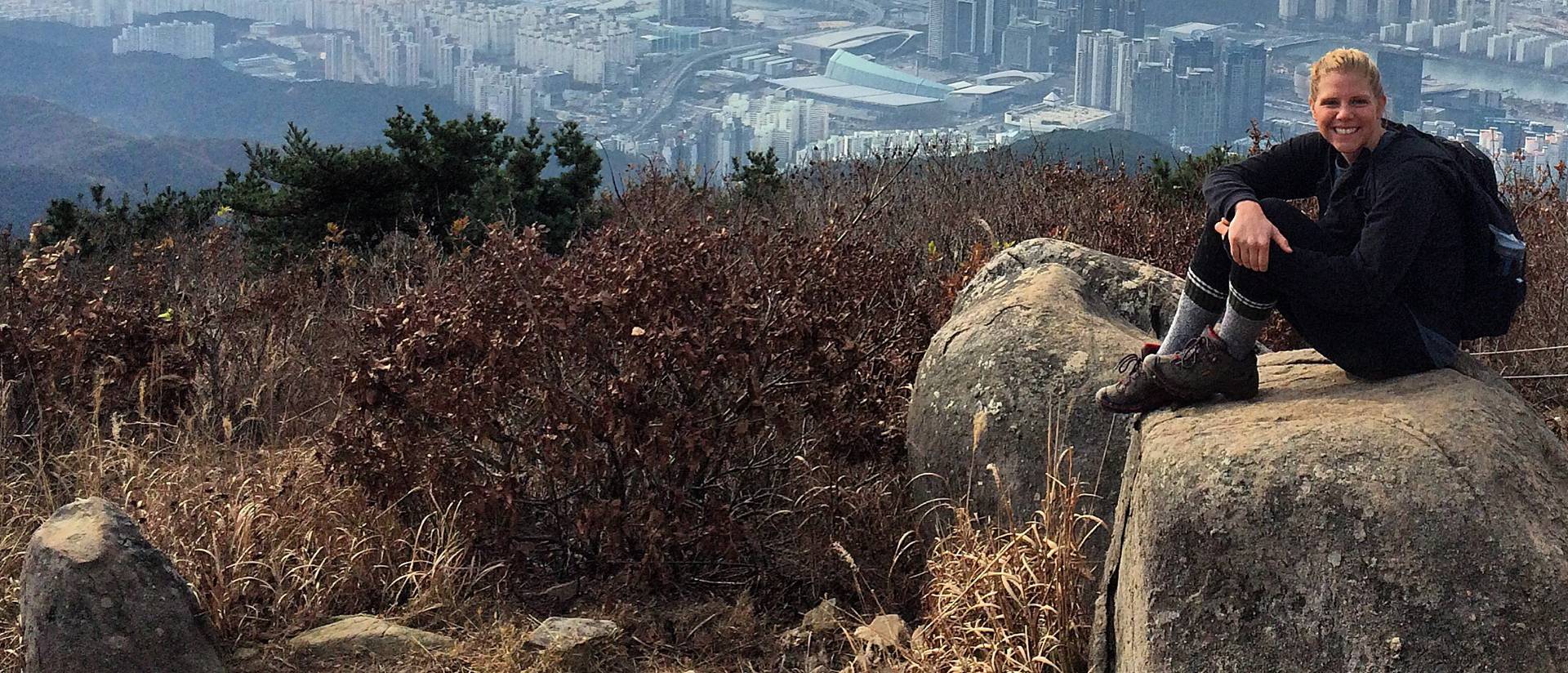  Elise Rooney sits on Jansang Mountain in her backyard in Busan, South Korea.