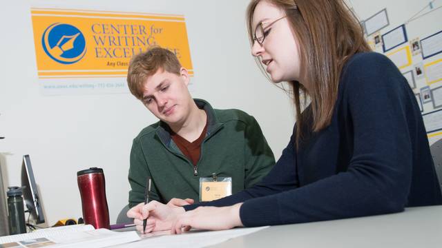 Two students collaborate in the Center for Writing Excellence