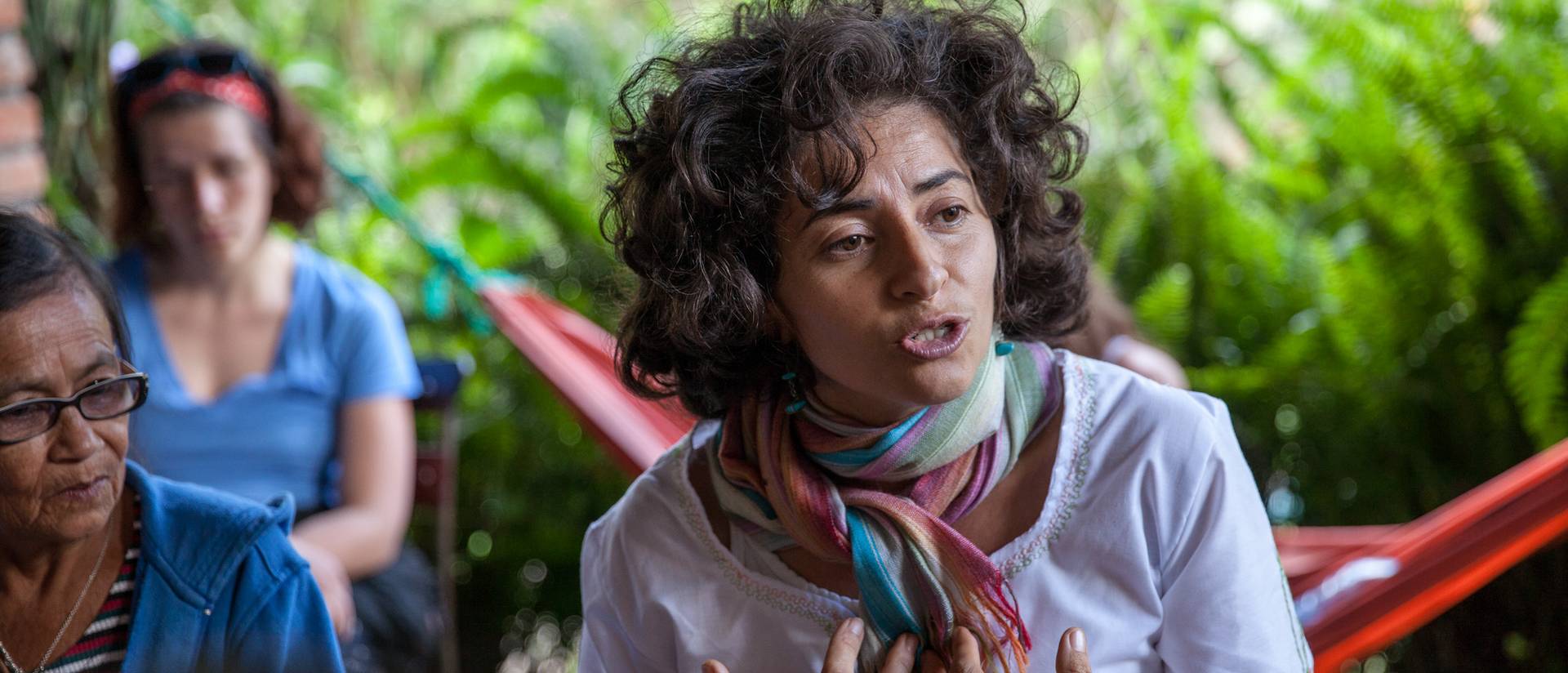 A person speaks to a group during an immersion trip to Nicaragua.