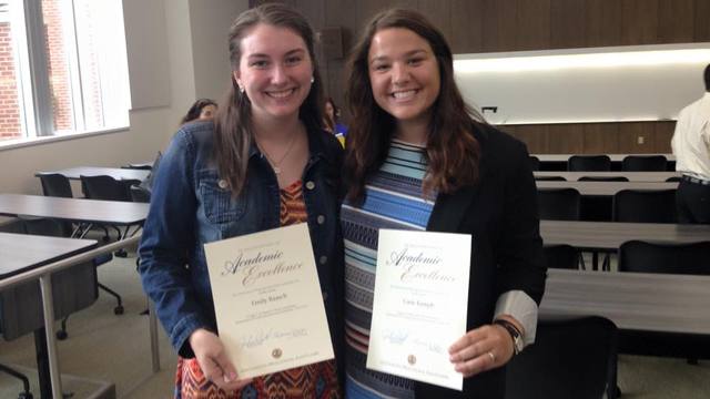 Students with their CJ scholarships