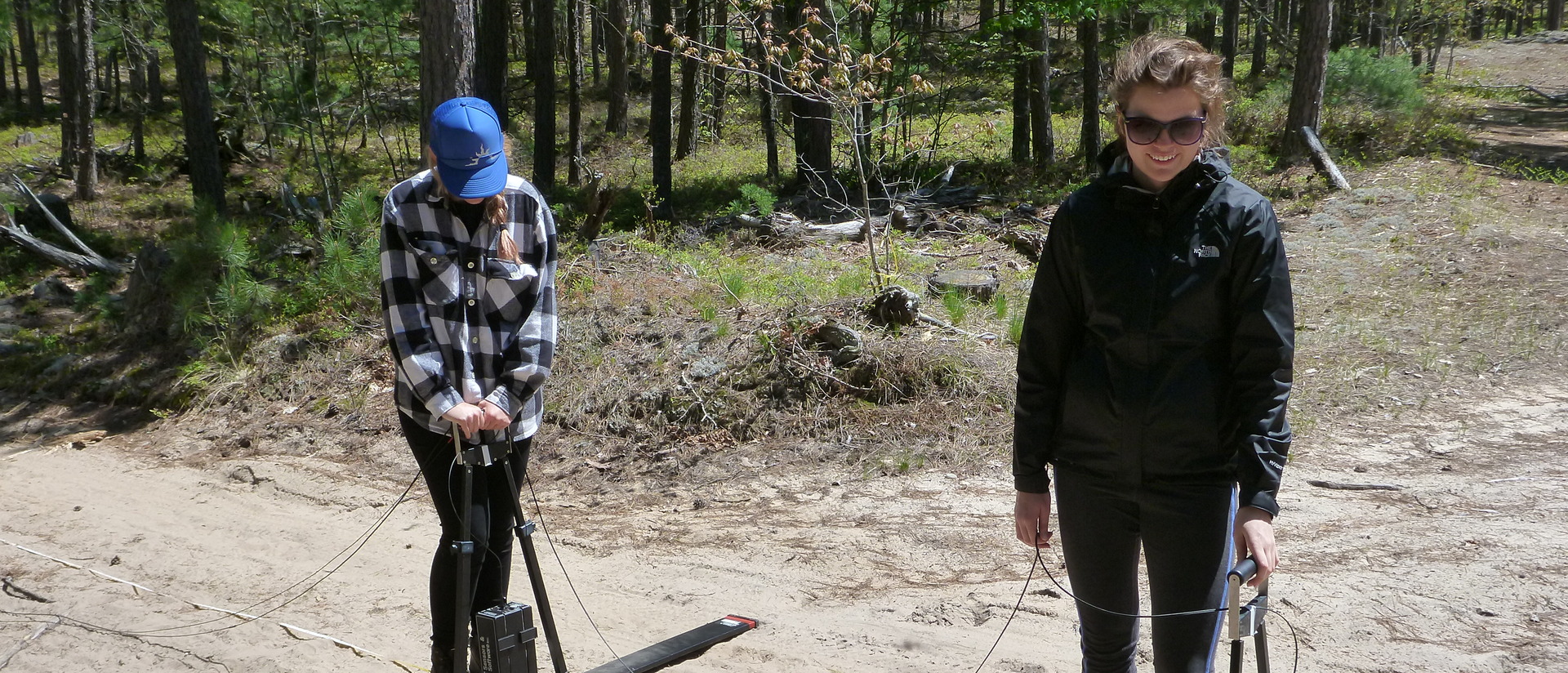 Two students conduct research