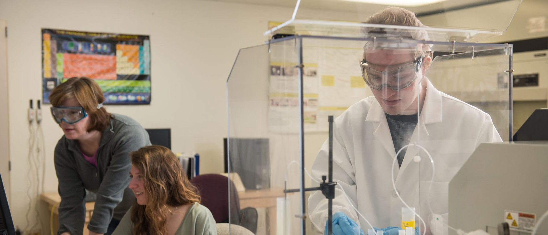 student in geochem lab