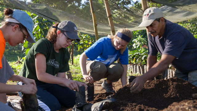 Students assisting with farming