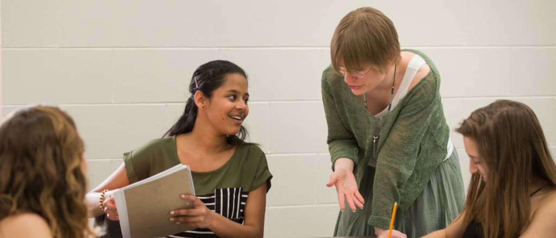 A professor and student work together.