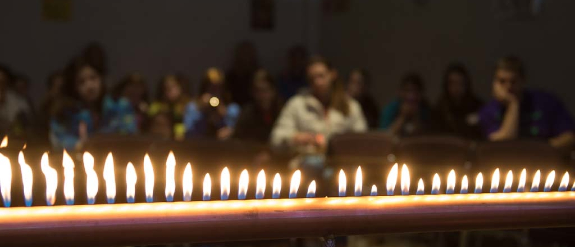 Students watch a fire experiment on Math