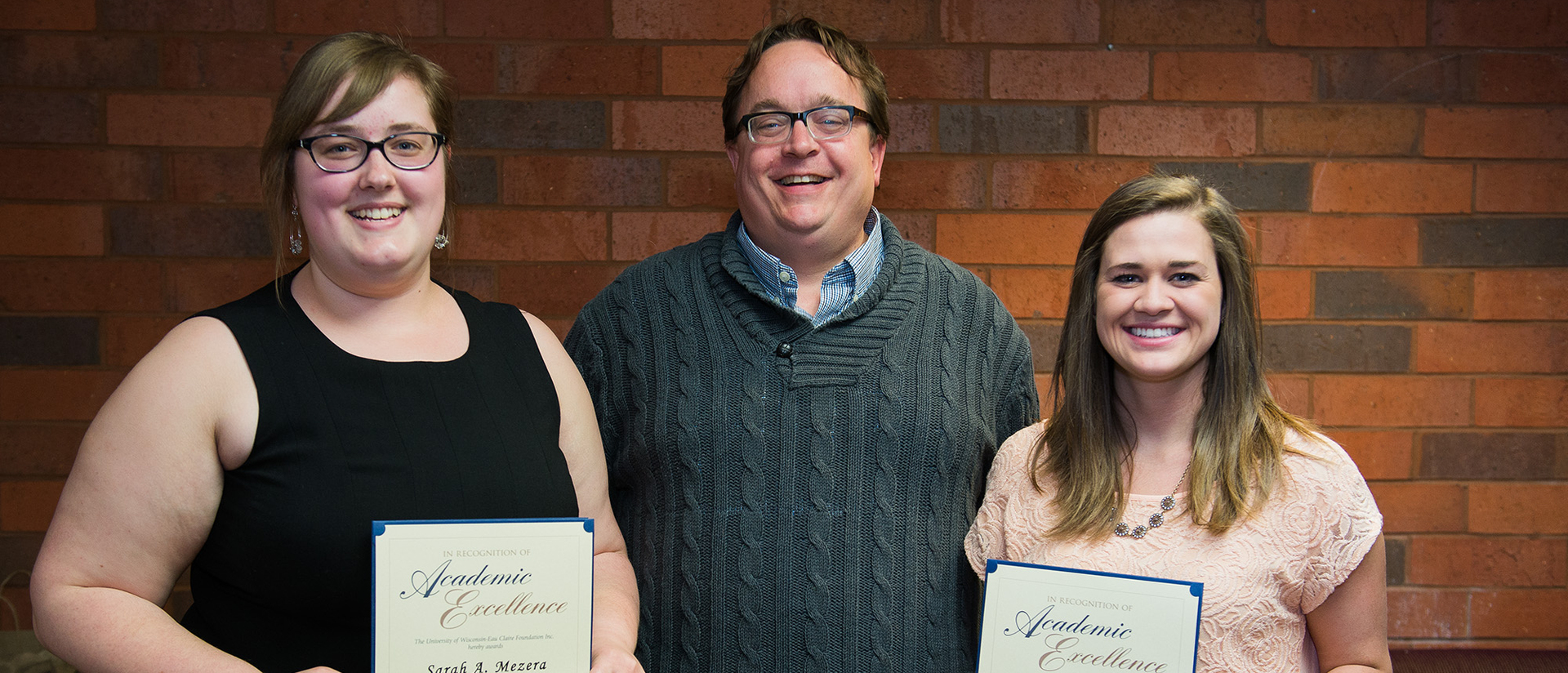 Dr. Peterson with scholarship winners