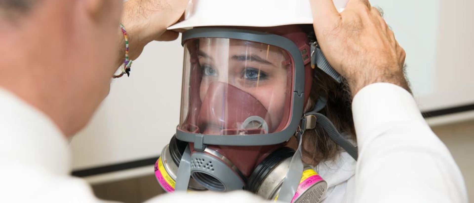 Student wearing respiratory mask