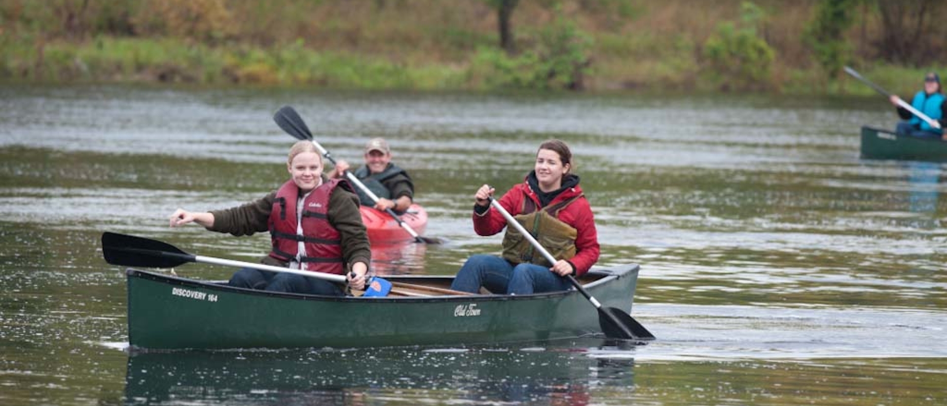 Student canoe in river
