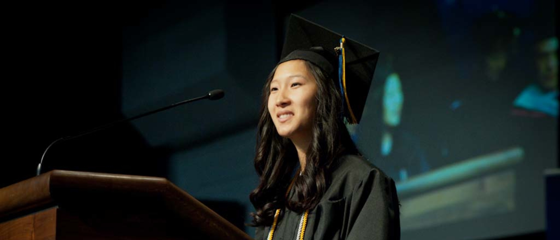 Student speaking at commencement.