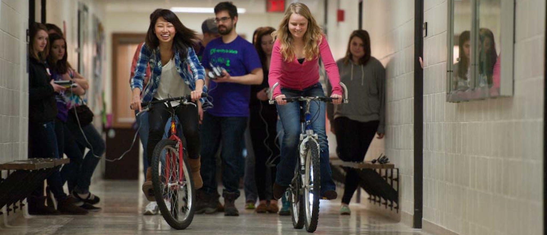 Students riding on bikes for math day
