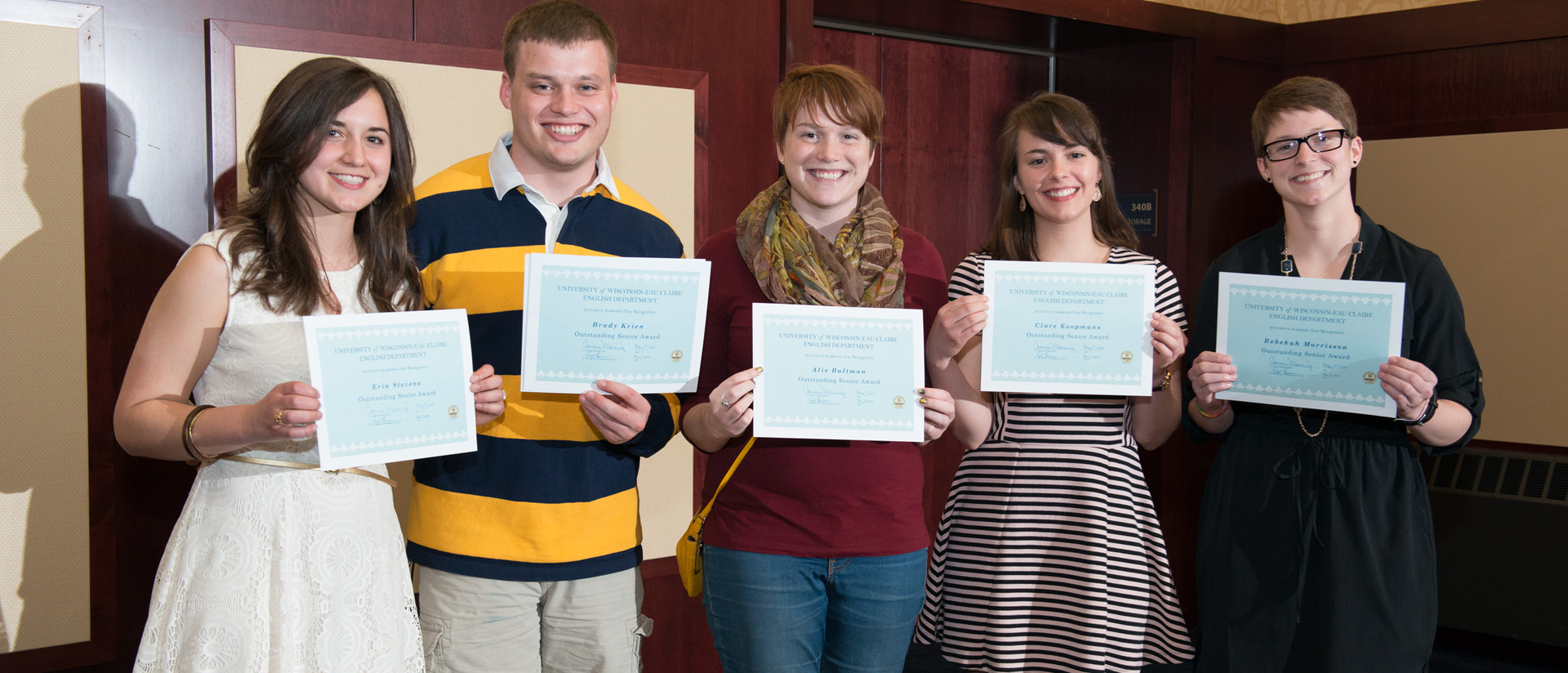 UWEC students posing with scholarships