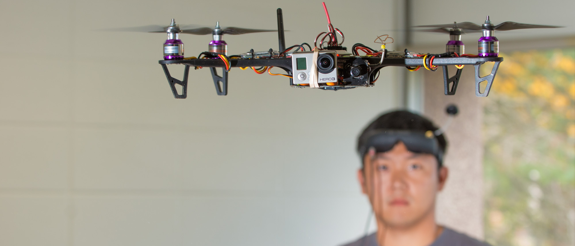 UWEC student working with drone