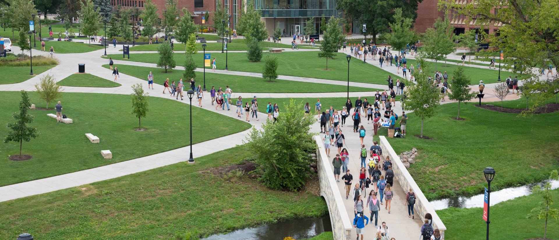 Students walking across campus mall