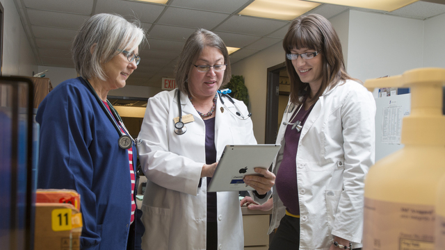 Female doctors talking.