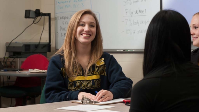 Smiling KINS student