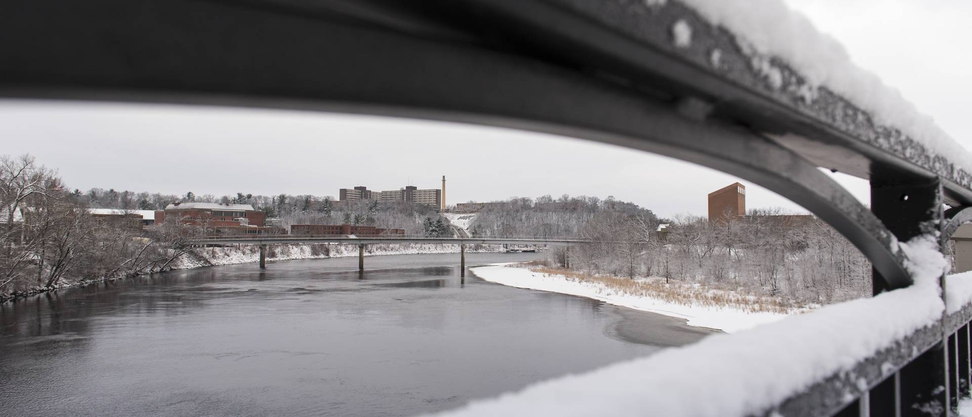 A view of the Chippewa River and campus taken from the Water Street bridge during the winter.