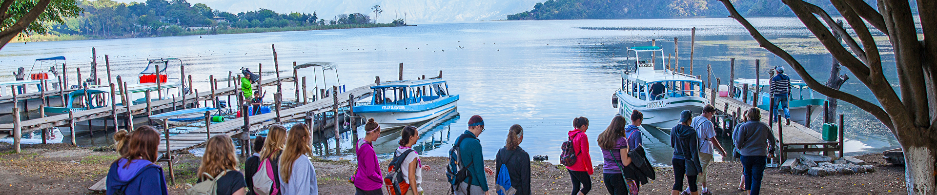 Students boarding boat in Guatemalan village
