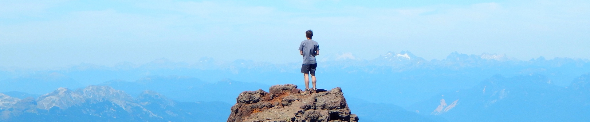 Student stands atop a volcano in Villarica National Park on the border of Chile and Argentina