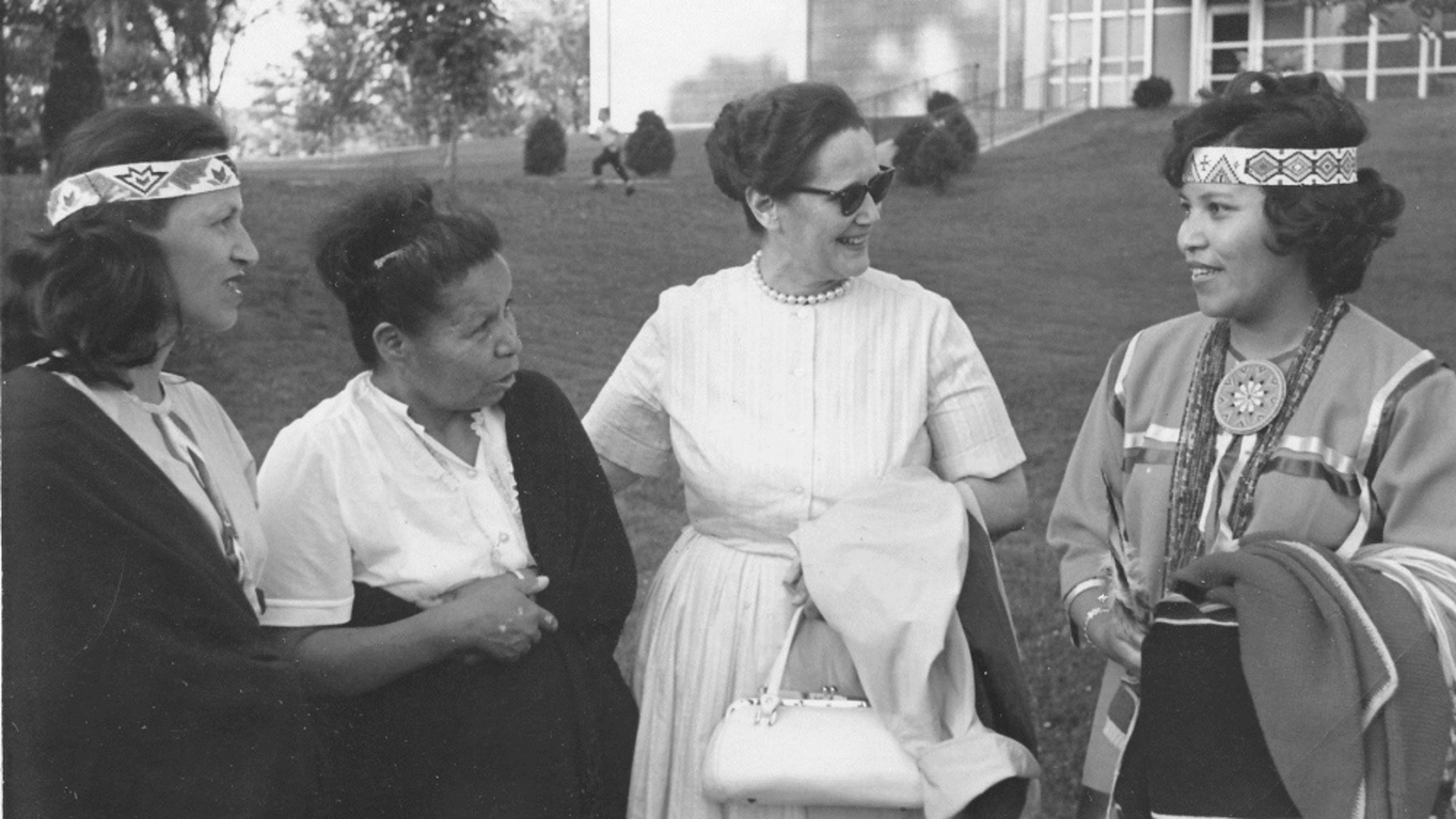 Veda Stone and students on campus, 1960's. 