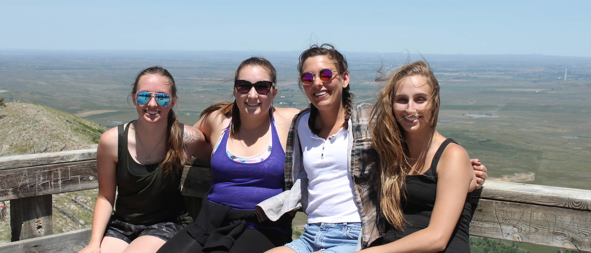 Taylor Younkle and other AIS students on the Pine Ridge immersion experience. Pictured at Badlands National Park. 