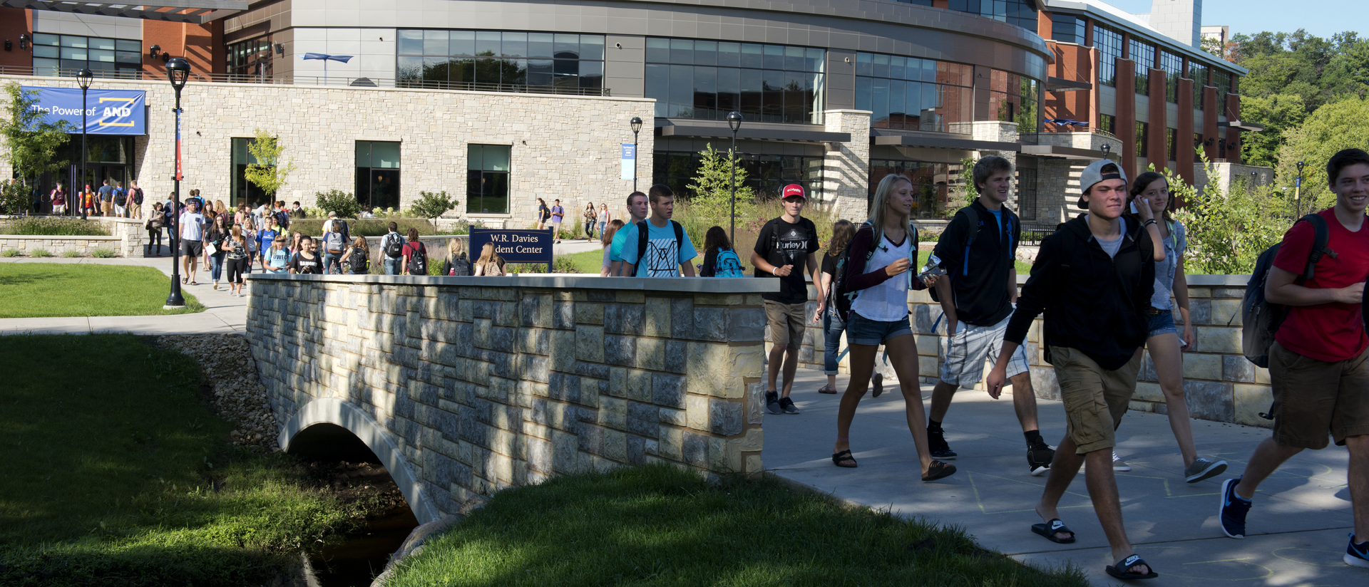 First day of school. Students walking over the bridge that leads to Davies.