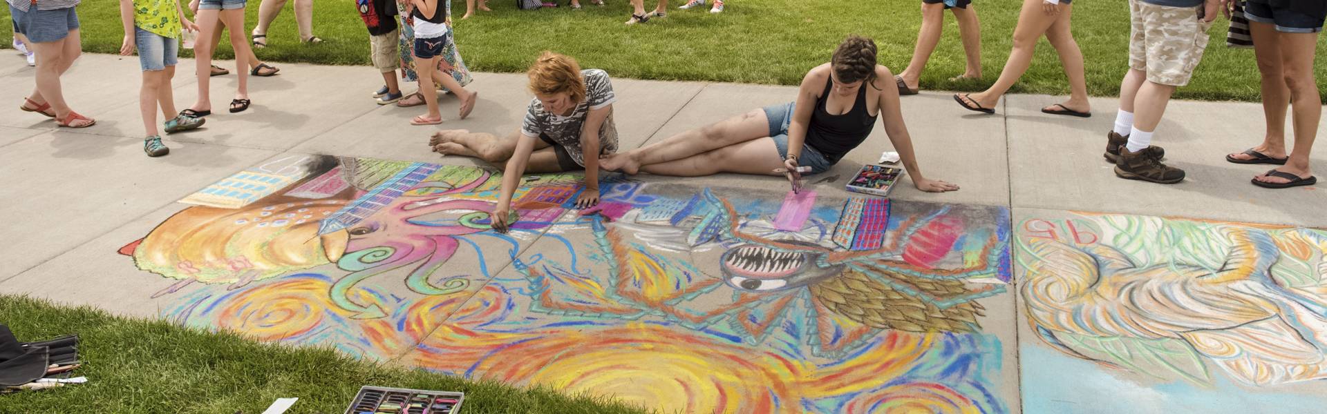 Families walk around the campus mall during Chalkfest.