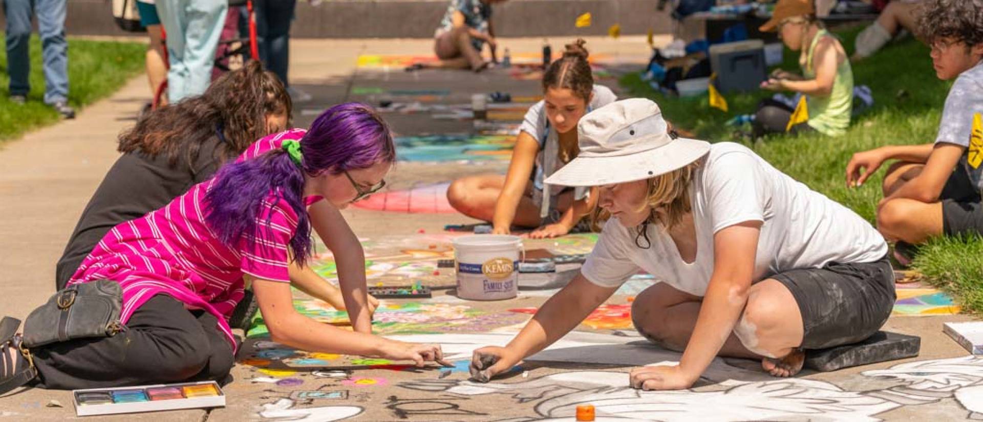 Families walk around the campus mall during Chalkfest.