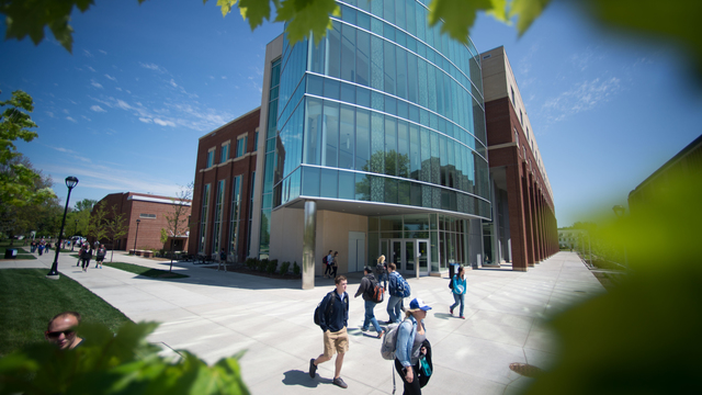 Students walking in front of Centennial Hall