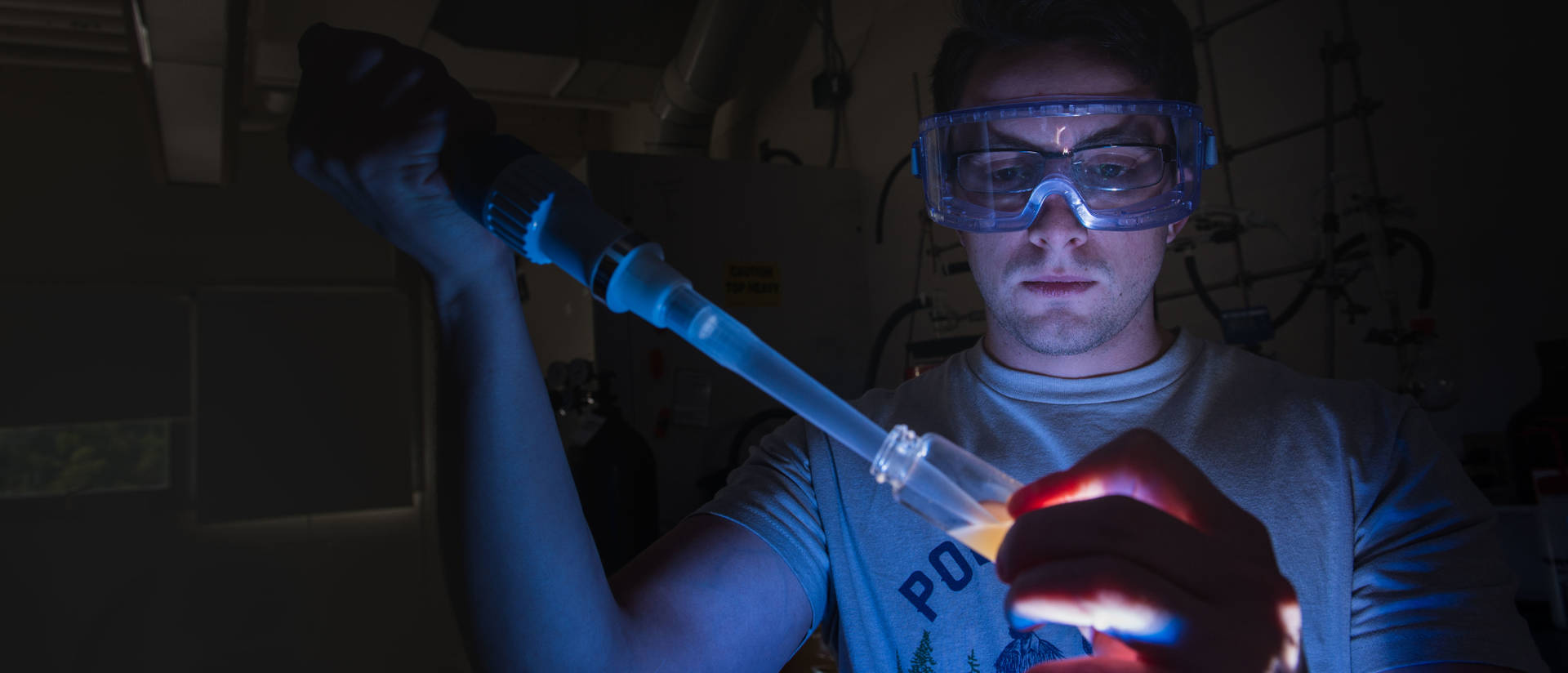 UWEC material science and engineering student working in lab