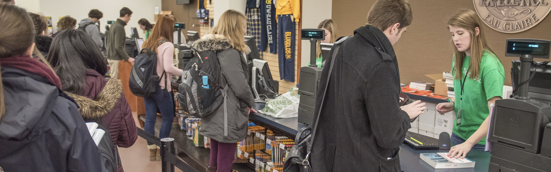 Students flock to the campus bookstore on their first day back.