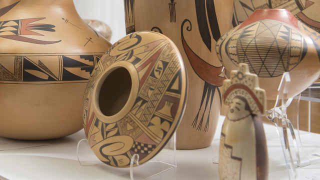 Greg Kocken works with pieces from LaBelle Miller Southwest Pottery Collection 