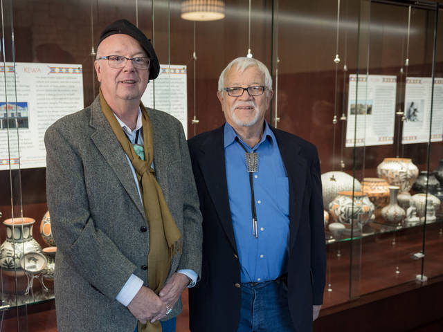 Richard LaBelle and Al Miller with pottery collection