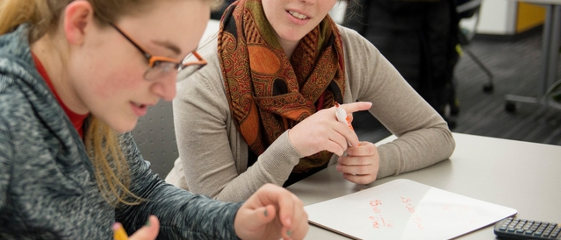 UWEC student getting tutoring in math lab