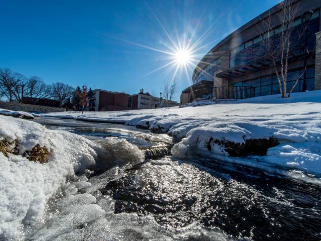 Winter campus beauty shot of Davies Center and Little Niagra.