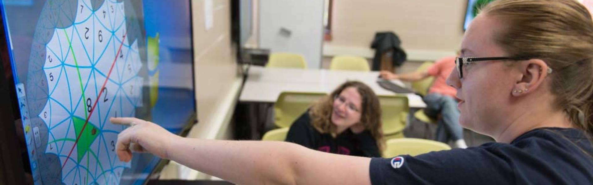 Students and faculty members participate in a math retreat day in Hibbard.